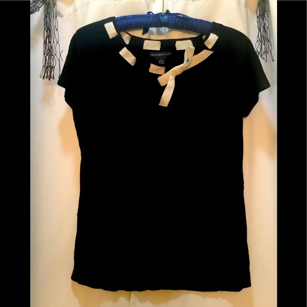 Black scoop neck sweater with ribbon accent.